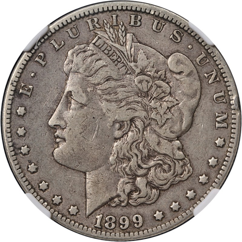NGC VF30 1899 O Morgan Silver Dollar Micro O: NGC VF30 1899 O Morgan Silver Dollar Micro O Original 1899-O Morgan Silver Dollar with Micro O designation, graded NGC VF30. This circulated silver coin is noted for great eye appeal, a nice strike, a