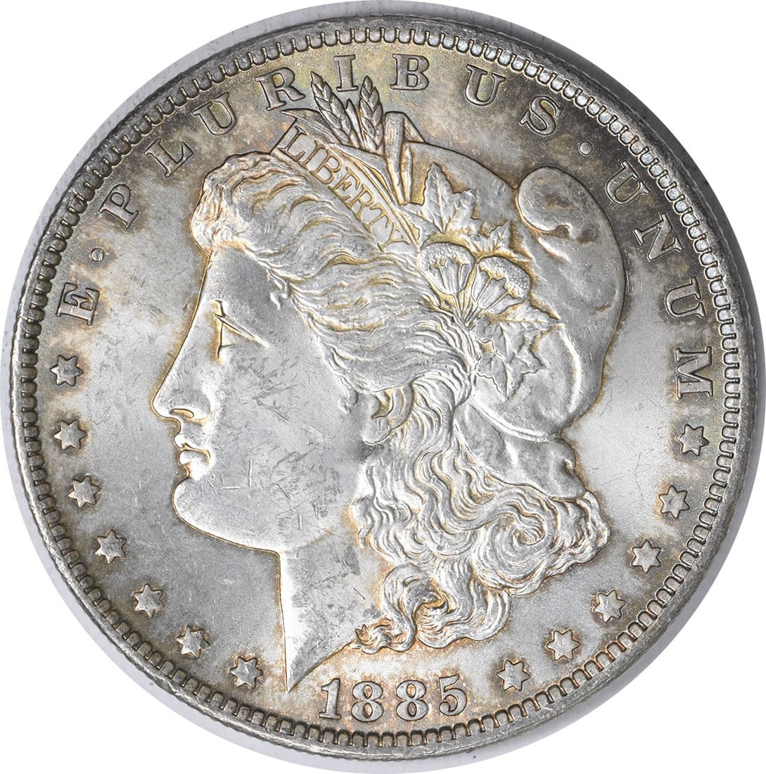 Choice BU 1885-O Silver Morgan Dollar Uncertified Toned Coin: Choice BU 1885-O Silver Morgan Dollar Uncertified Toned Coin This is an 1885-O Morgan Silver Dollar featuring attractive toning. The coin is uncirculated and graded as Choice Brilliant Uncirculated (B