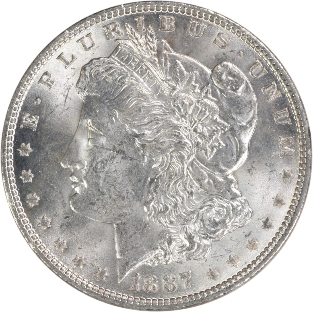 Brilliant Uncirculated 1887 Morgan Dollar Silver Coin Uncertified: Brilliant Uncirculated 1887 Morgan Dollar Silver Coin Uncertified This is an uncirculated 1887 Morgan Silver Dollar from the United States, featuring a Brilliant Uncirculated (BU) grade. The coin is c
