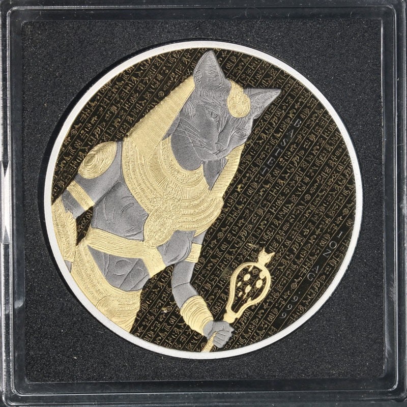 Golden Darkness of Egypt Bastet 2025 Benin 1 oz Silver Coin with OGP: Golden Darkness of Egypt Bastet 2025 Benin 1 oz Silver Coin with OGP This 2025 Benin 1 Ounce Silver coin features the Golden Darkness of Egypt Bastet design. Struck in .999 fine silver, it has a denom