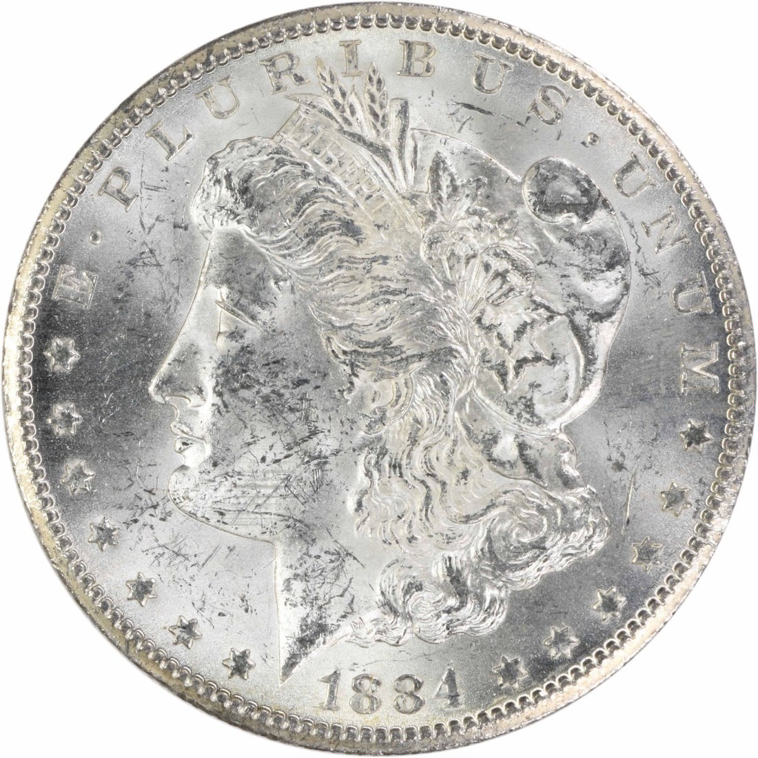 1884 Carson City CC Morgan Silver Dollar $1 Uncertified: 1884 Carson City CC Morgan Silver Dollar $1 Uncertified An 1884-CC Morgan silver dollar in uncirculated condition, certified as uncertified. It is a United States $1 coin with the CC mint mark from Ca