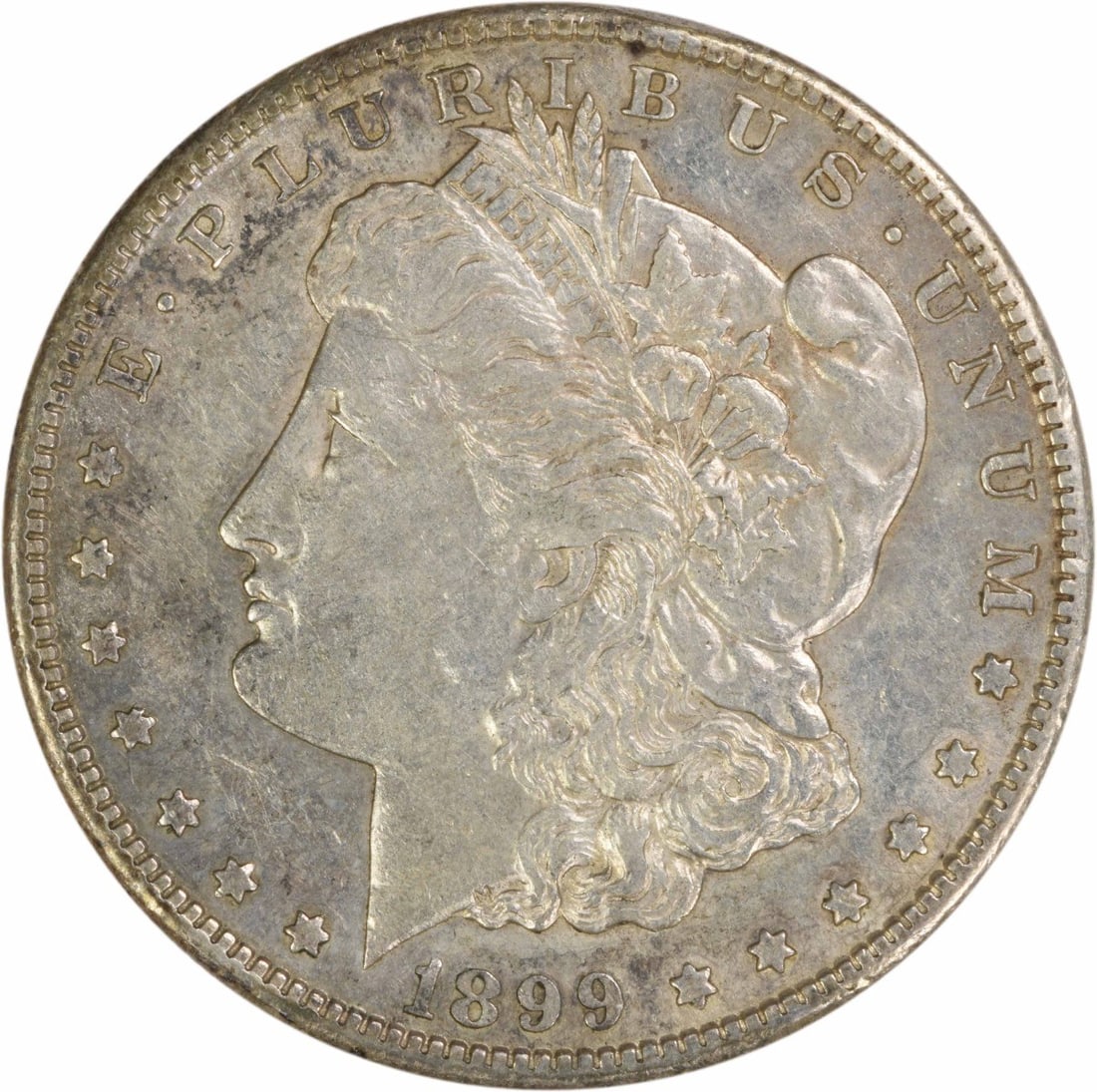 AU 1899 San Francisco Morgan Dollar 90 Percent Silver Uncertified: AU 1899 San Francisco Morgan Dollar 90 Percent Silver Uncertified This 1899-S Morgan Silver Dollar is an attractive example from the San Francisco Mint. Composed of 90% silver and 10% copper, it featu