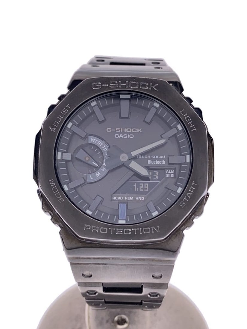 Casio G Shock GM B2100 stainless steel men's wristwatch: Casio G Shock GM B2100 stainless steel men's wristwatch This CASIO G-SHOCK GM-B2100 men's wristwatch features a durable stainless steel construction in black. Designed for reliability and everyday wea