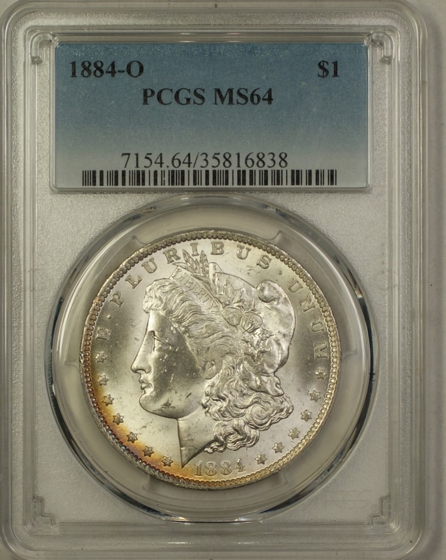 PCGS MS64 1884-O Morgan Dollar Silver Coin With Light Toning on Rim: PCGS MS64 1884-O Morgan Dollar Silver Coin With Light Toning on Rim This 1884-O Morgan Silver Dollar features a $1 denomination and was minted in New Orleans. Certified by PCGS with a grade of MS-64, 