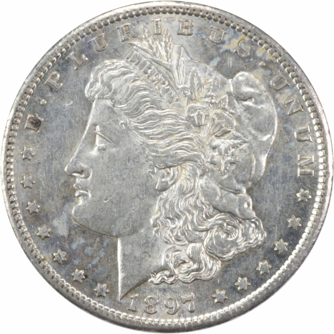 1897-S Morgan Silver Dollar AU Uncertified San Francisco Mint: 1897-S Morgan Silver Dollar AU Uncertified San Francisco Mint This 1897-S Morgan Silver Dollar is a remarkable piece of numismatic history, featuring the iconic design by George T. Morgan. With a comp