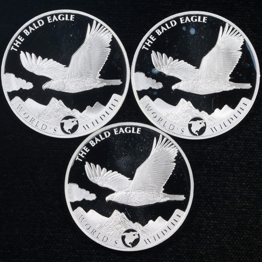 3 Silver 20 Francs Coins 2021 Congo Bald Eagle World's Wildlife: 3 Silver 20 Francs Coins 2021 Congo Bald Eagle World's Wildlife Original 2021 Congo World's Wildlife: Bald Eagle silver coin set with strong eye appeal, luster, and strike. This pre-owned set may have