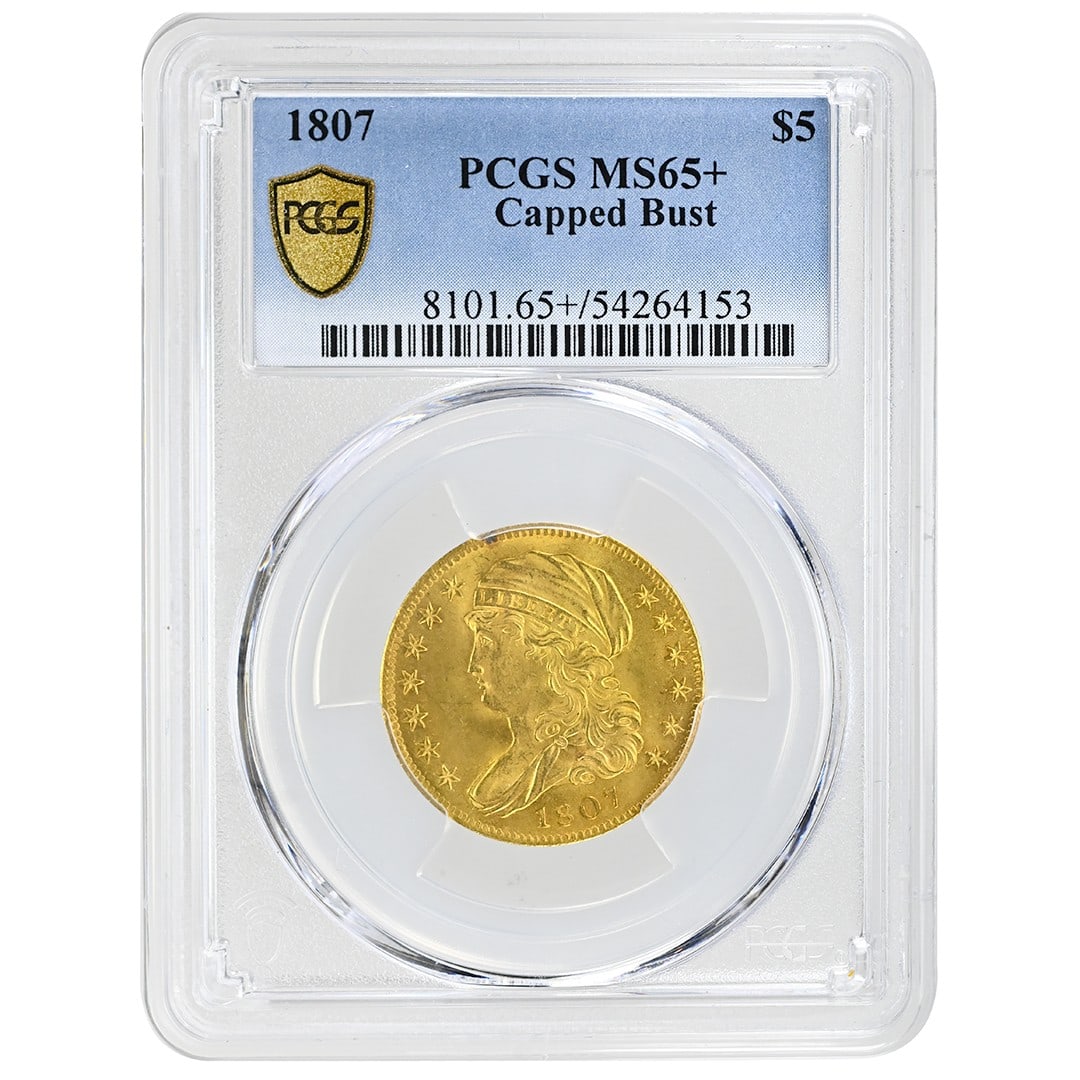 1807 $5 Gold Coin Capped Bust Left PCGS MS65: 1807 $5 Gold Coin Capped Bust Left PCGS MS65 Rare 1807 $5 Capped Bust Left gold coin certified by PCGS. This United States coin from the Philadelphia Mint is listed as uncirculated and graded MS65+. P