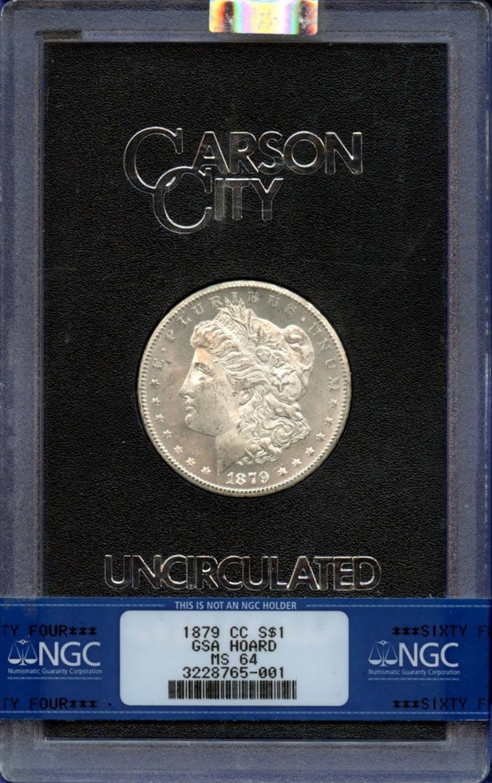 NGC MS64 1879 Carson City GSA Morgan Silver Dollar Uncirculated: NGC MS64 1879 Carson City GSA Morgan Silver Dollar Uncirculated This is an uncirculated 1879-CC Morgan Dollar from the GSA Hoard, graded MS64 by NGC. Minted in Carson City, this pre-owned United State
