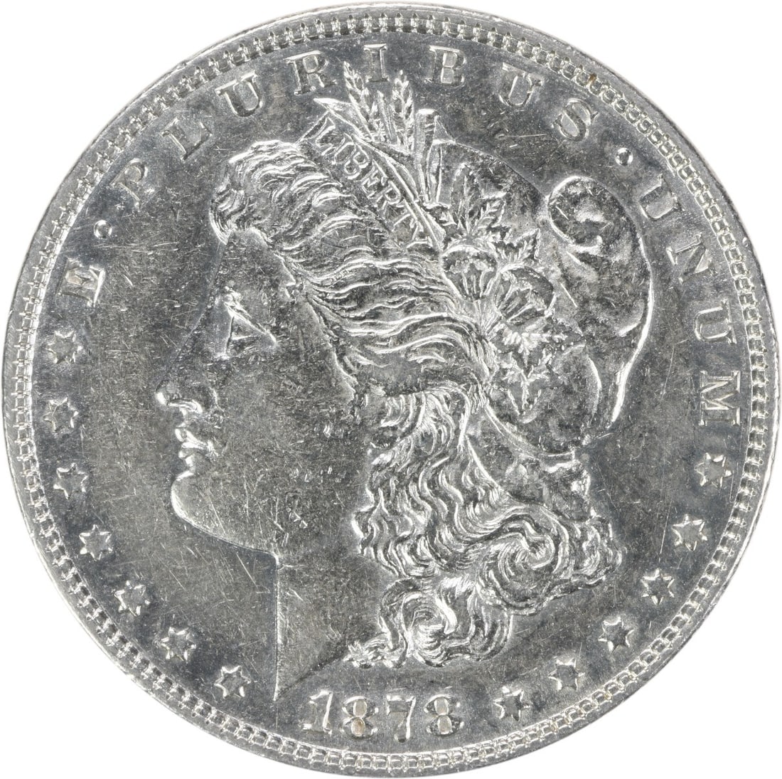 1878 Morgan Silver Dollar AU Uncertified 90% Silver Philadelphia Coin: 1878 Morgan Silver Dollar AU Uncertified 90% Silver Philadelphia Coin This 1878 Morgan Silver Dollar features exquisite craftsmanship and historical significance. Struck in 90% silver and 10% copper, 