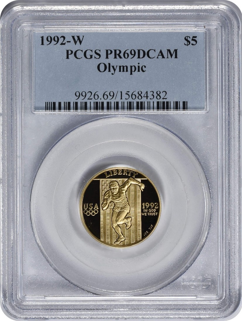 PCGS PR69DCAM 1992-W Olympic Gold Five Dollar Proof Coin: PCGS PR69DCAM 1992-W Olympic Gold Five Dollar Proof Coin This is a 1992-W Olympic $5 Gold Commemorative coin, produced by the United States Mint. Struck in proof quality, this coin features a grade of
