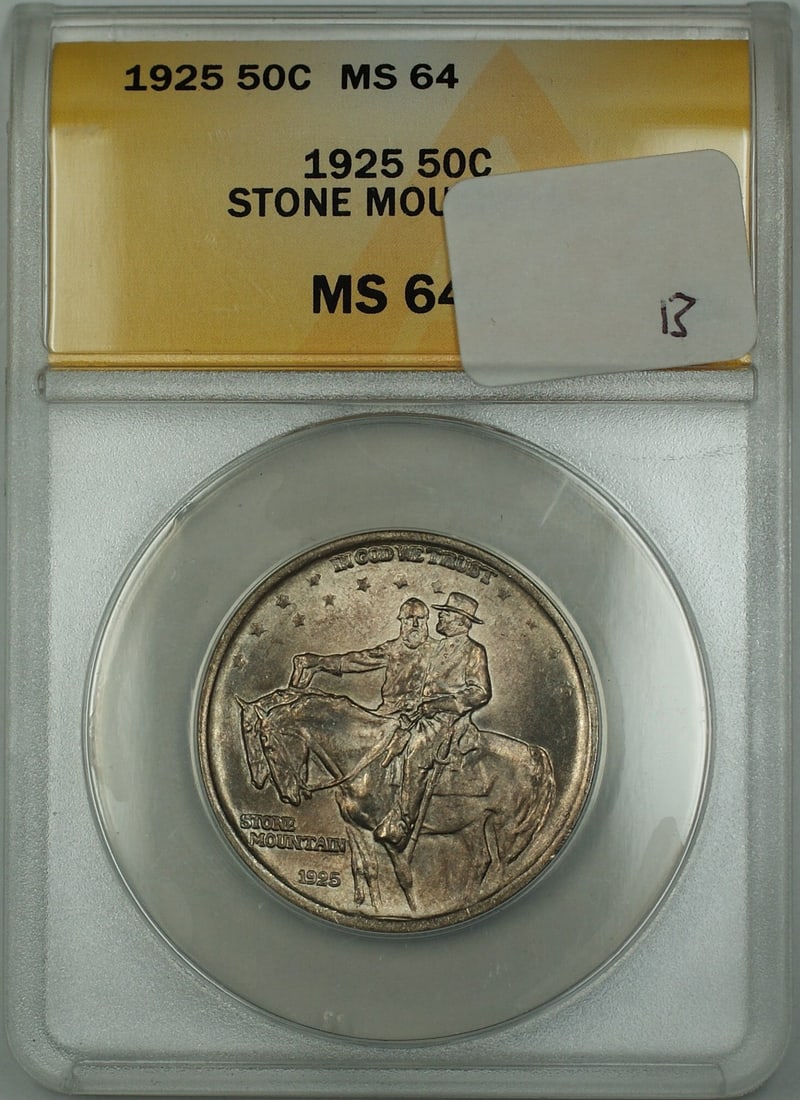 ANACS MS-64 1925 Stone Mountain Silver Half Dollar Toned Commemorative Coin: ANACS MS-64 1925 Stone Mountain Silver Half Dollar Toned Commemorative Coin This is a 1925 Stone Mountain Commemorative Silver Half Dollar coin, certified by ANACS with a grade of MS-64. The coin has 