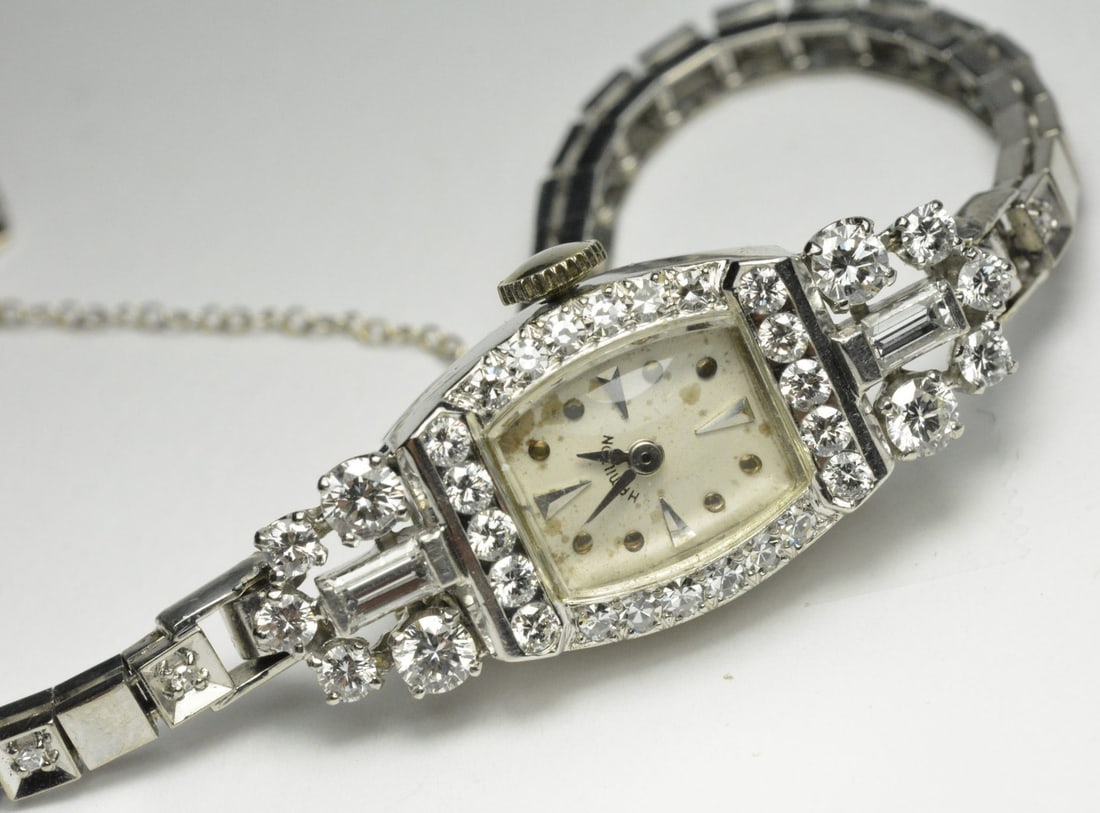 Hamilton platinum diamond ladies wristwatch 14k white gold bracelet: Hamilton platinum diamond ladies wristwatch 14k white gold bracelet This vintage Hamilton ladies wristwatch features a platinum and diamond case with a 14k white gold bracelet band. The case is stampe