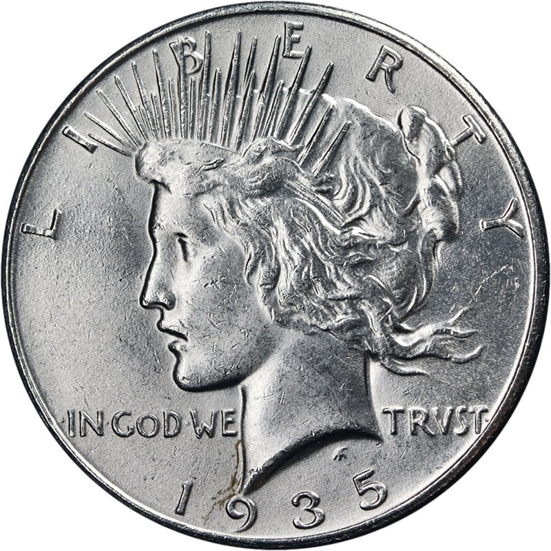1935 Philadelphia Mint Silver Peace Dollar Coin United States: 1935 Philadelphia Mint Silver Peace Dollar Coin United States This is a 1935 Peace Dollar minted in Philadelphia. The coin is composed of 90% silver and is in circulated, pre-owned condition. It is un