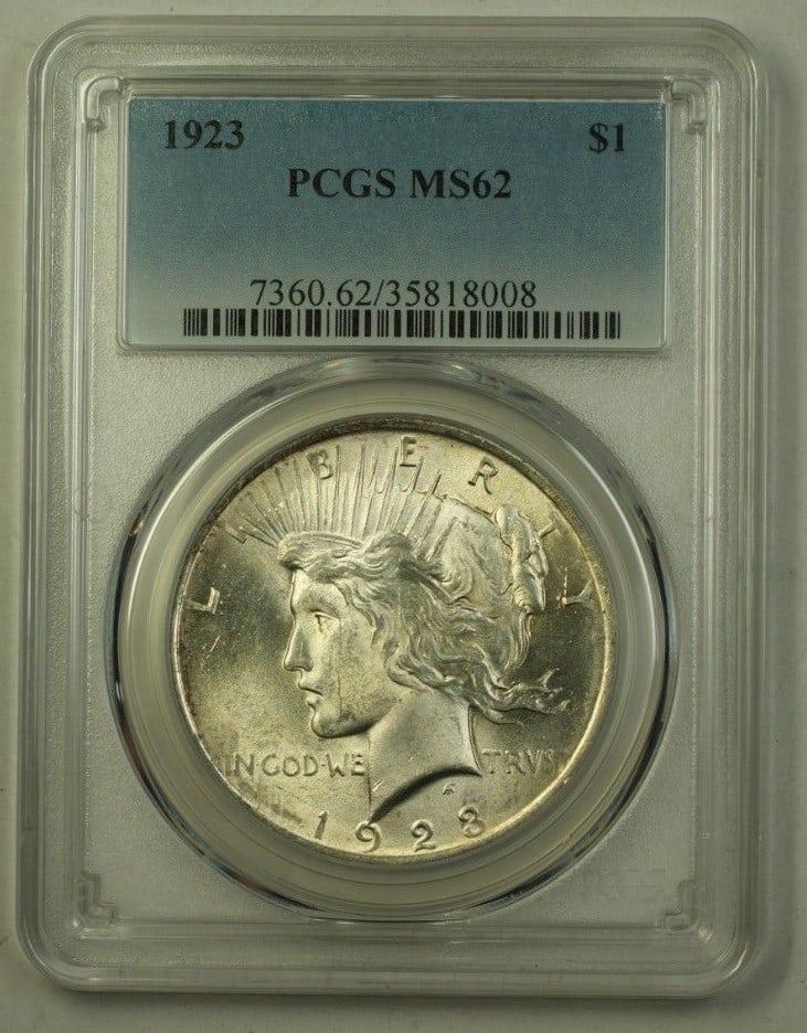PCGS MS62 1923 Peace Dollar Silver $1: PCGS MS62 1923 Peace Dollar Silver $1 This 1923 US Silver Peace Dollar is graded MS-62 by PCGS and was minted in Philadelphia. The coin is composed of silver, remains uncirculated, and is certified by