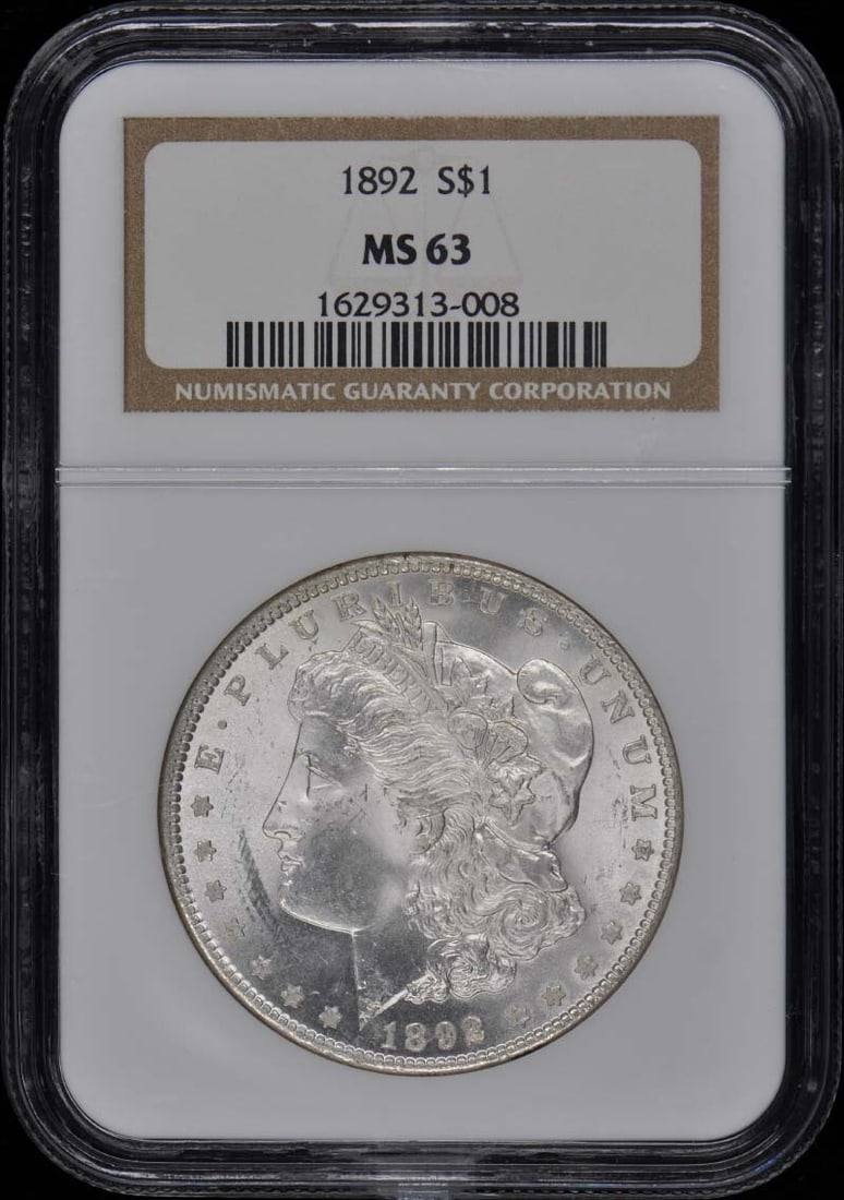1892 Morgan Dollar NGC MS63 Uncirculated Philadelphia Mint: 1892 Morgan Dollar NGC MS63 Uncirculated Philadelphia Mint This 1892 Morgan Dollar is a remarkable piece certified by NGC with a grade of MS63, indicating its uncirculated condition. Struck at the Phi