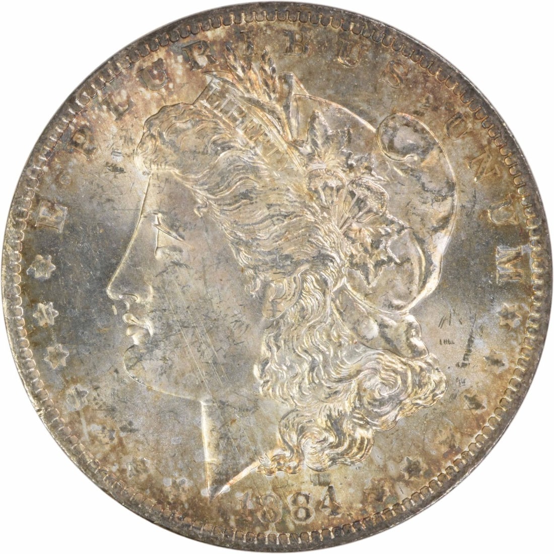 Toned 1884-O Morgan Silver Dollar Choice BU Uncirculated Uncertified: Toned 1884-O Morgan Silver Dollar Choice BU Uncirculated Uncertified This 1884-O Morgan Silver Dollar is a choice brilliant uncirculated coin featuring attractive toning. Struck at the New Orleans Min