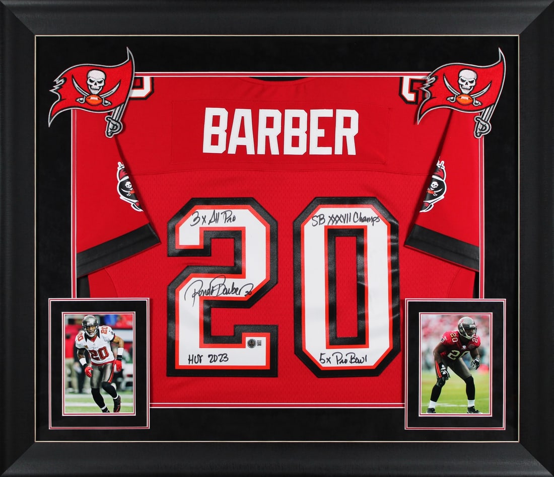 Ronde Barber Signed Red Buccaneers Throwback Jersey with 4 Inscriptions BAS Authenticated: Ronde Barber Signed Red Buccaneers Throwback Jersey with 4 Inscriptions BAS Authenticated Celebrate the legacy of Ronde Barber with this autographed Tampa Bay Buccaneers Red Mitchell & Ness Throwback 