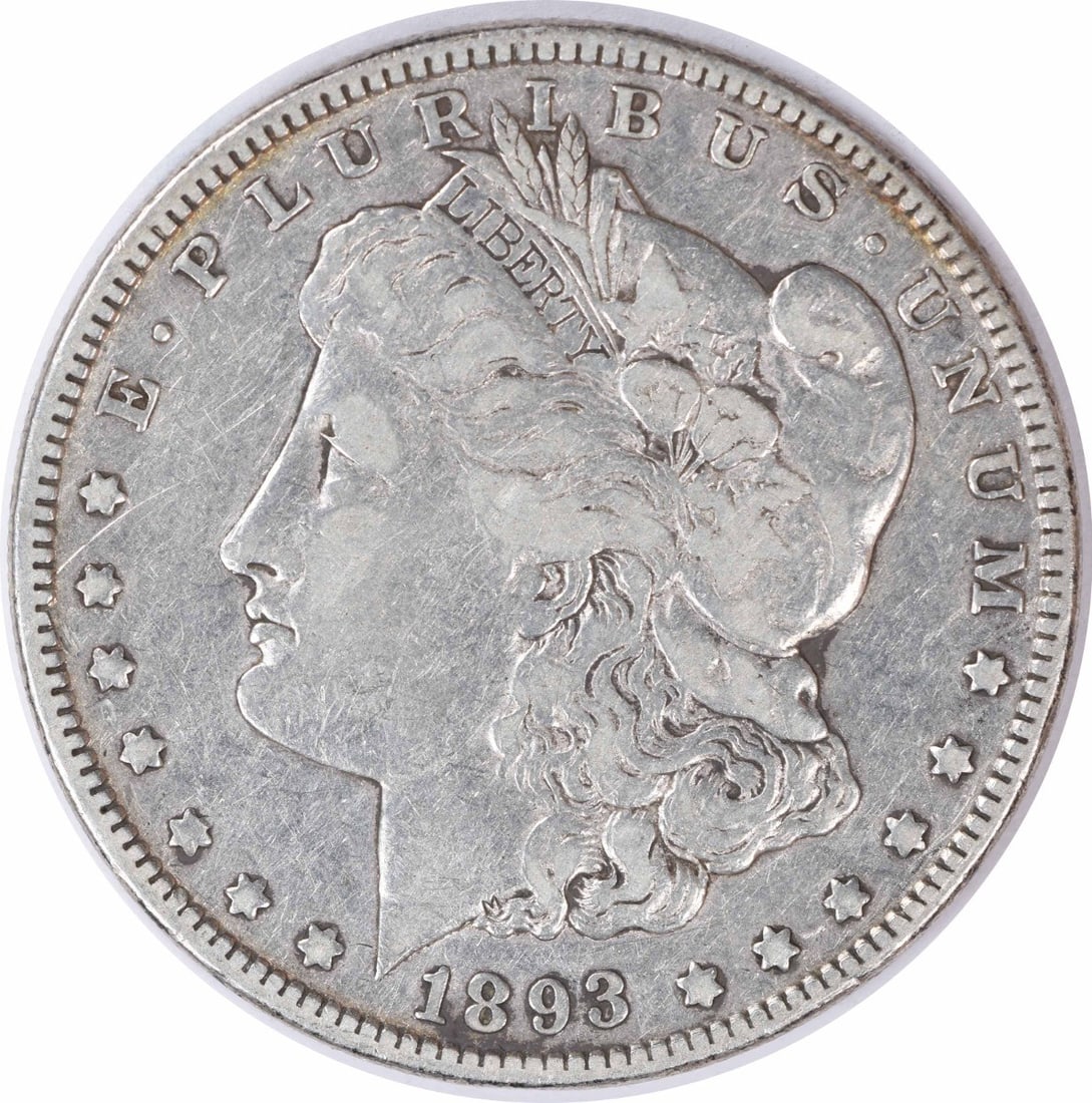 1893 Morgan Silver Dollar Uncertified VF 90% Silver Coin: 1893 Morgan Silver Dollar Uncertified VF 90% Silver Coin This 1893 Morgan Silver Dollar, graded as Very Fine (VF), showcases the classic design by George T. Morgan. The coin, minted in Philadelphia, f