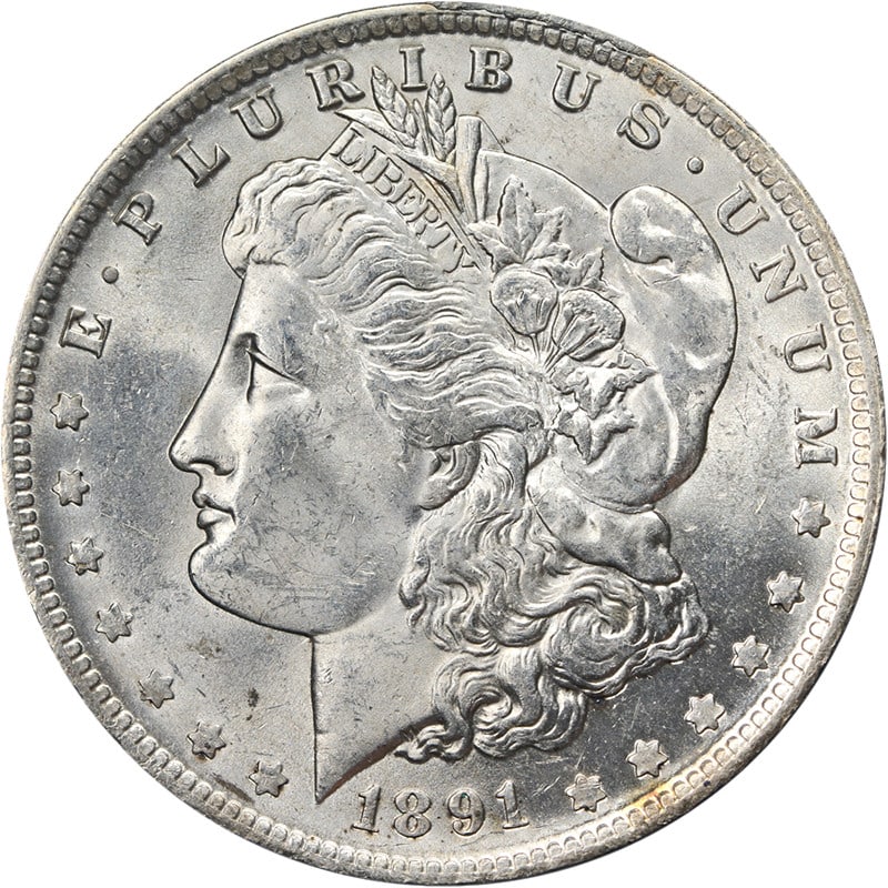 1891 O Morgan Dollar Silver BU Plus Details: 1891 O Morgan Dollar Silver BU Plus Details This 1891-O Morgan Silver Dollar is an uncirculated coin featuring attractive luster, strong strike, and appealing color. The coin displays nice surfaces wi