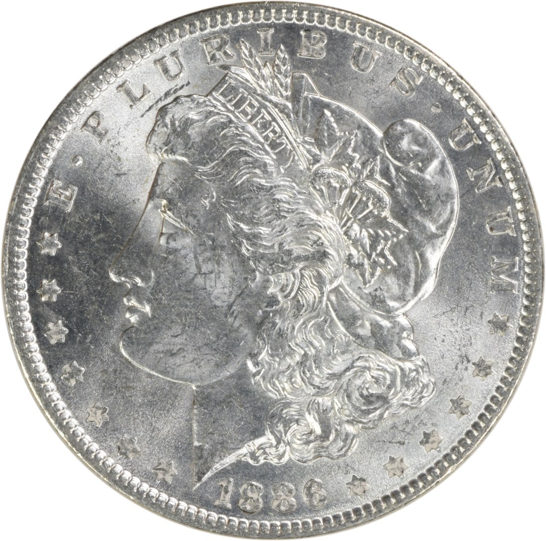 Brilliant Uncirculated 1886 Silver Dollar Morgan Uncertified No Mint Mark: Brilliant Uncirculated 1886 Silver Dollar Morgan Uncertified No Mint Mark This is an 1886 Morgan Silver Dollar from the United States, featuring brilliant uncirculated (BU) condition. The coin is comp