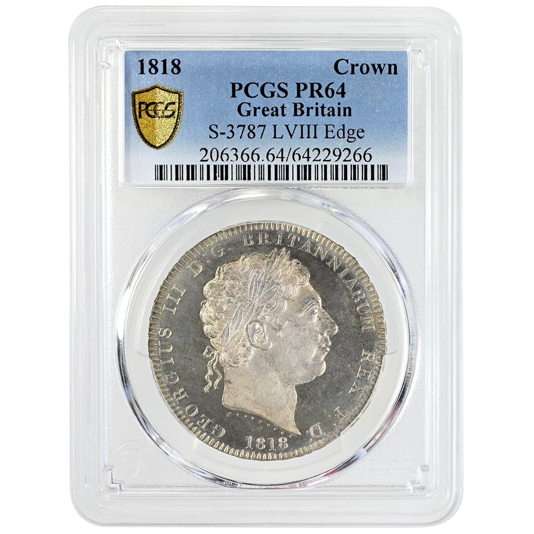 1818 England Silver Crown George III LVIII Edge PCGS PR64: 1818 England Silver Crown George III LVIII Edge PCGS PR64 1818 George III Crown coin from England, struck in silver and certified by PCGS as PR64. This pre-owned example features the LVIII edge design