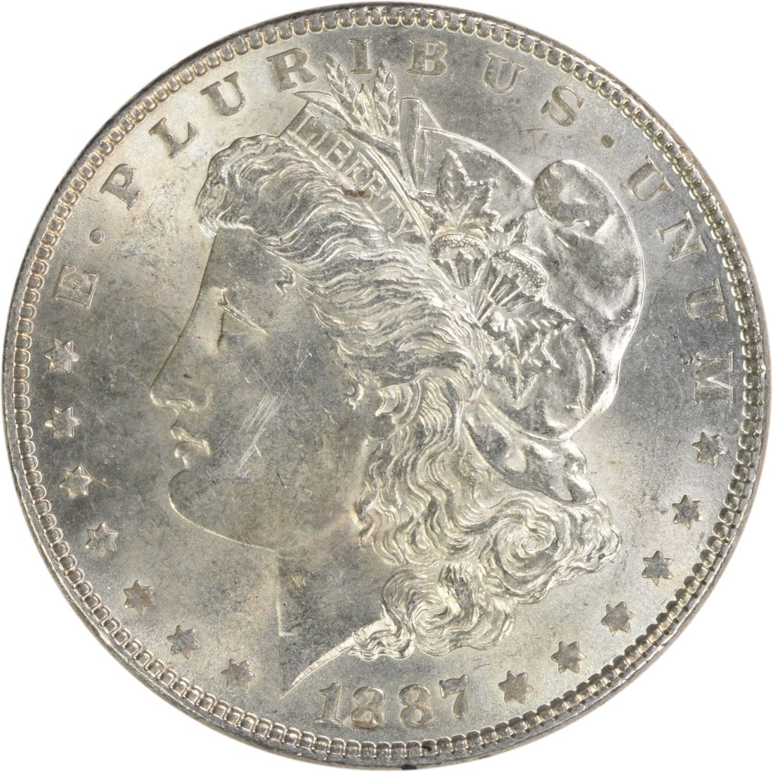 Uncirculated 1887 Silver Morgan Dollar Brilliant Uncirculated Uncertified: Uncirculated 1887 Silver Morgan Dollar Brilliant Uncirculated Uncertified This is an uncirculated 1887 Morgan Silver Dollar featuring brilliant uncirculated (BU) quality. Struck in silver without a mi