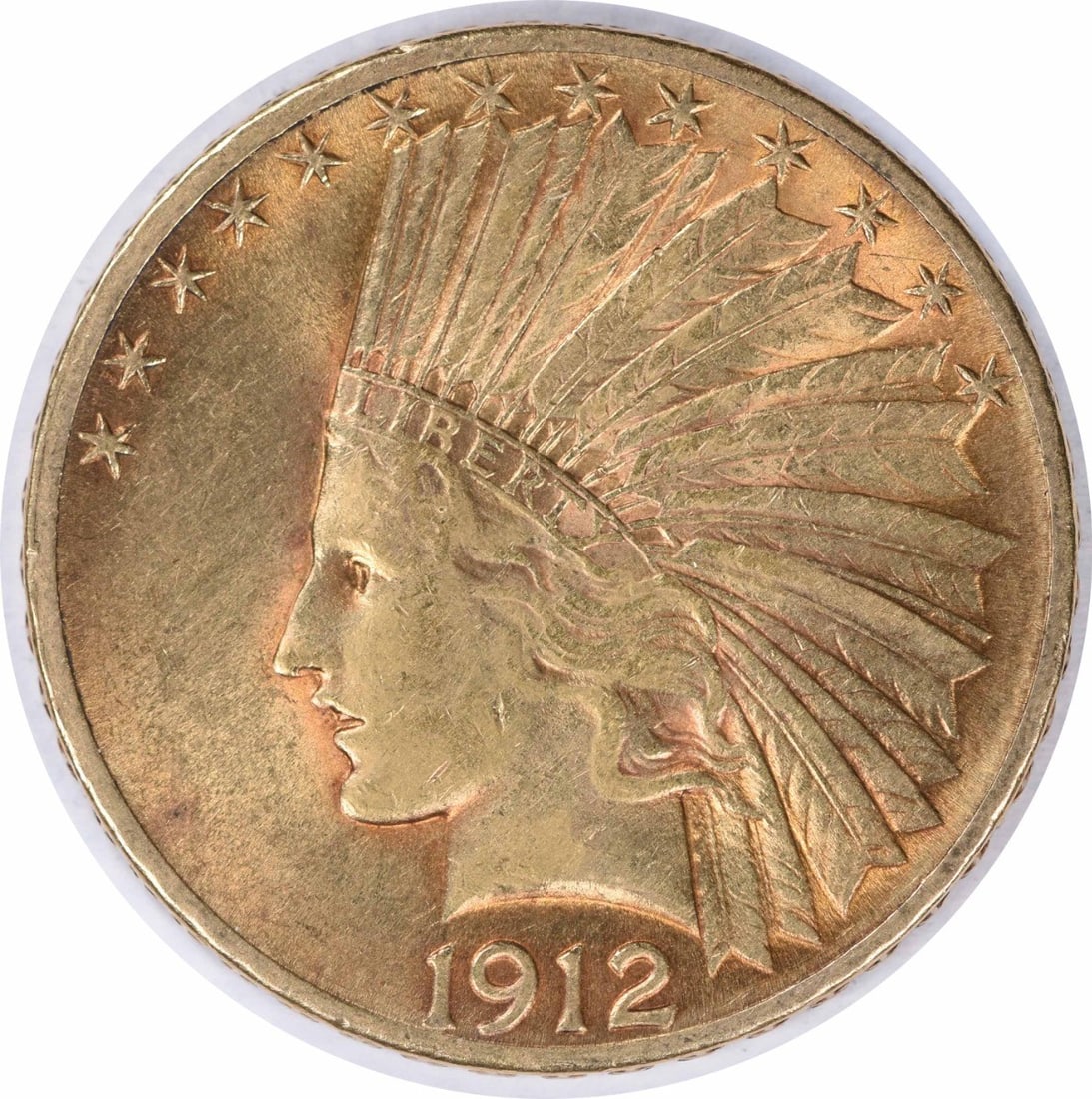 1912 $10 Gold Indian Coin by Augustus Saint Gaudens AU Uncertified: 1912 $10 Gold Indian Coin by Augustus Saint Gaudens AU Uncertified This 1912 $10 Gold Indian coin is a beautiful example of early 20th-century American numismatics, featuring the distinguished design 