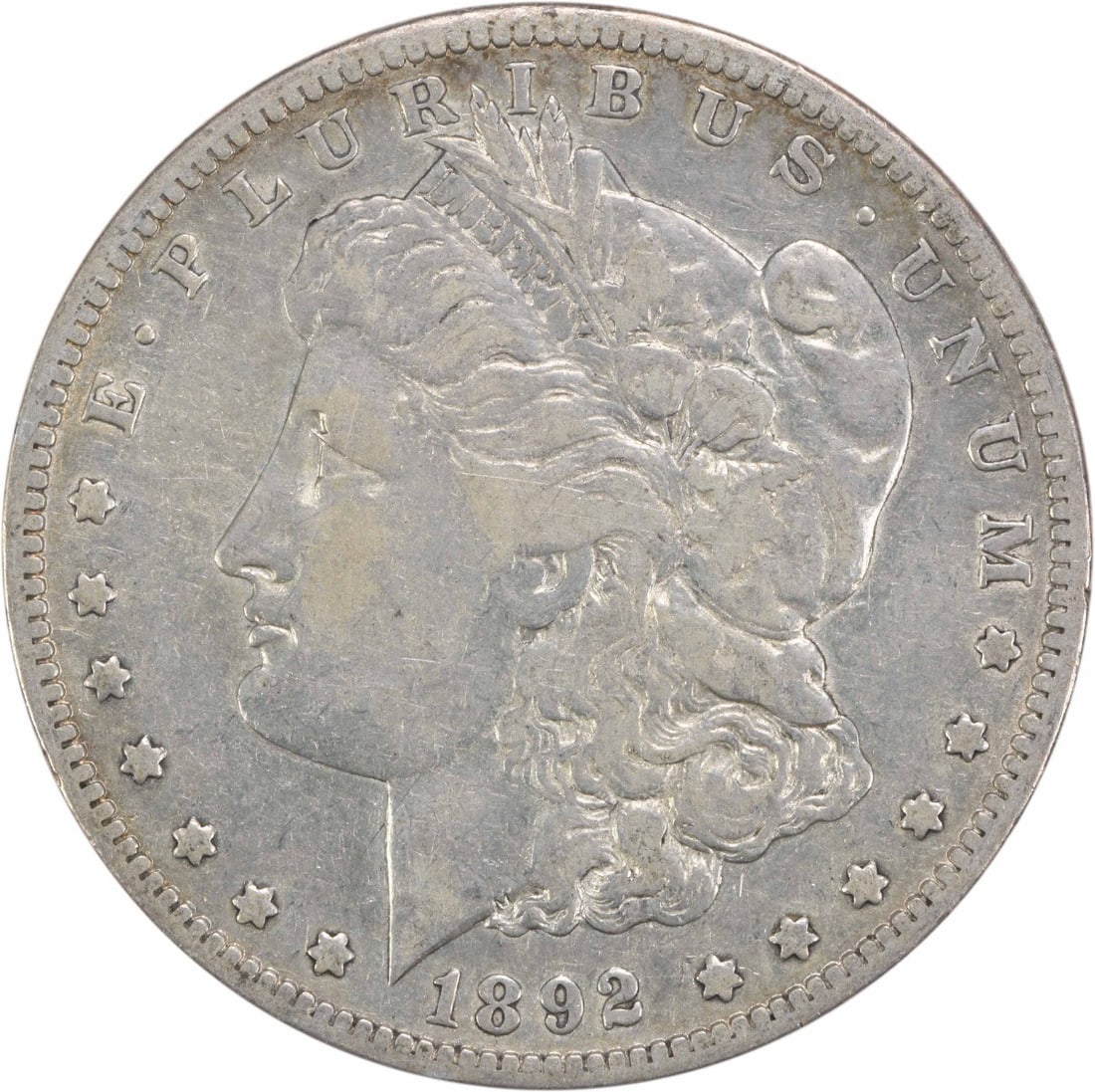 1892-S Morgan Silver Dollar VF Circulated 90% Silver Coin: 1892-S Morgan Silver Dollar VF Circulated 90% Silver Coin This 1892-S Morgan Silver Dollar is a remarkable piece of numismatic history. It features a composition of 90% silver and 10% copper, with a s