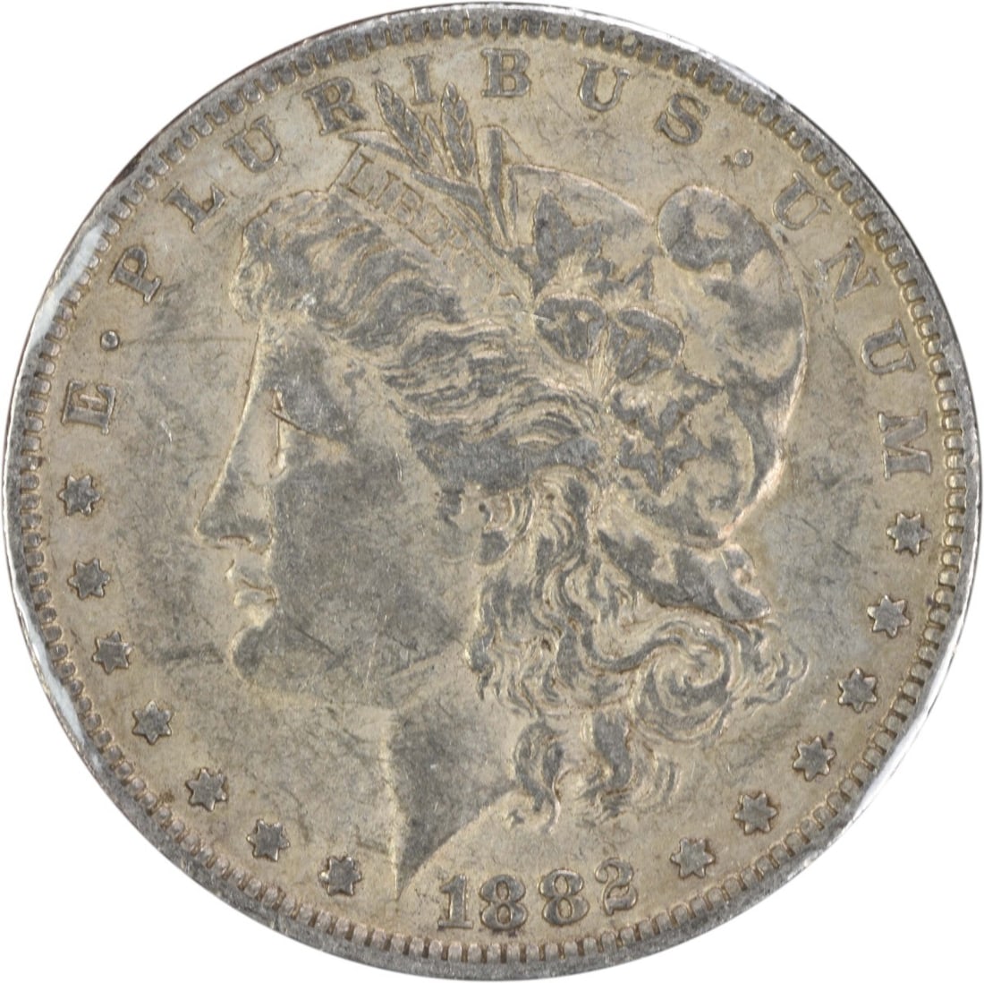 1882-O Morgan Silver Dollar EF Uncertified 90% Silver Coin: 1882-O Morgan Silver Dollar EF Uncertified 90% Silver Coin This 1882-O/S Morgan Silver Dollar is a remarkable piece of numismatic history. Struck in 1882 at the New Orleans Mint, this coin features a 