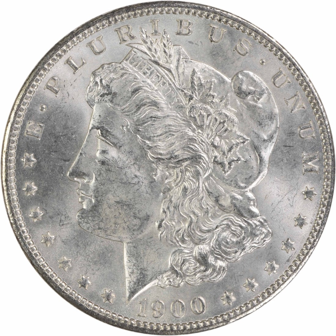 Uncirculated 1900 Silver Dollar Morgan Type Brilliant Uncertified Example: Uncirculated 1900 Silver Dollar Morgan Type Brilliant Uncertified Example This is a 1900 Morgan Silver Dollar from the United States. The coin is uncirculated and in Brilliant Uncirculated (BU) condit