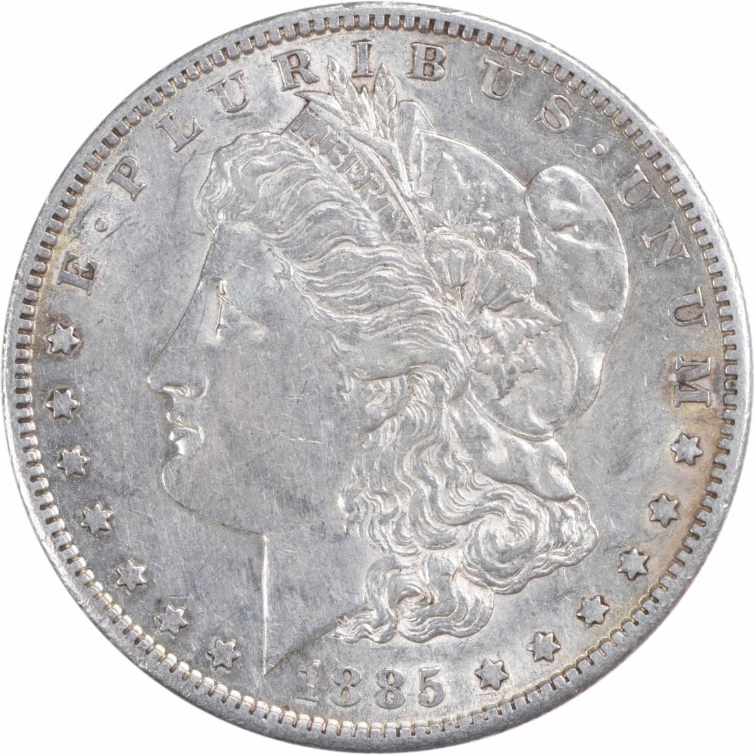 1885-S Morgan Silver Dollar AU Uncertified 90% Silver Coin: 1885-S Morgan Silver Dollar AU Uncertified 90% Silver Coin This 1885-S Morgan Silver Dollar is a remarkable piece of American numismatic history. Struck in San Francisco, this coin features a beautifu