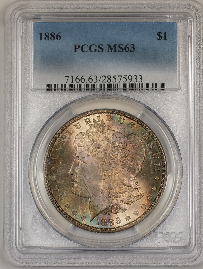 PCGS MS63 1886 Silver Morgan Dollar Philadelphia Nicely Toned Obverse: PCGS MS63 1886 Silver Morgan Dollar Philadelphia Nicely Toned Obverse This 1886 Morgan Silver Dollar is certified by PCGS with a grade of MS-63, indicating an uncirculated condition. The coin features