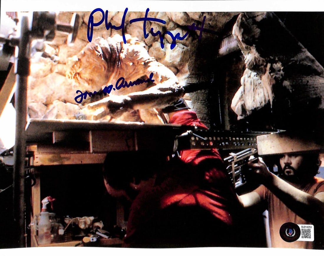 Beckett Authenticated Rancor Behind the Scenes 8x10 Photo Signed by Tippett and St. Amand: Beckett Authenticated Rancor Behind the Scenes 8x10 Photo Signed by Tippett and St. Amand This 8x10 behind-the-scenes photograph from Star Wars: Return of the Jedi features the iconic Rancor creature 