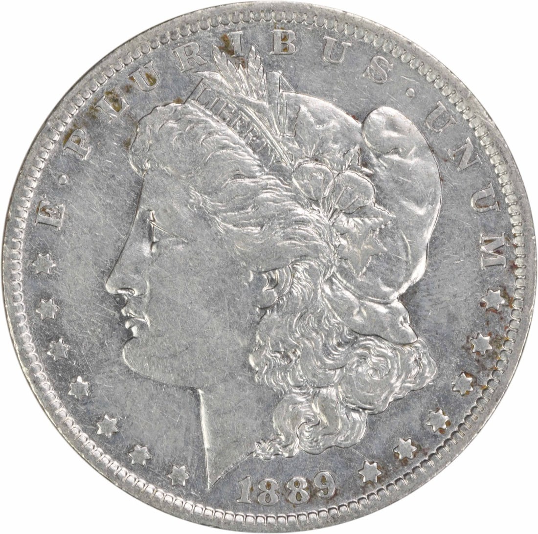 Morgan Dollar 1889 O New Orleans Mint 90 Percent Silver EF Grade Uncertified: Morgan Dollar 1889 O New Orleans Mint 90 Percent Silver EF Grade Uncertified This 1889-O Morgan Silver Dollar is an Extra Fine (EF) grade coin from the New Orleans Mint. Designed by George T. Morgan, 