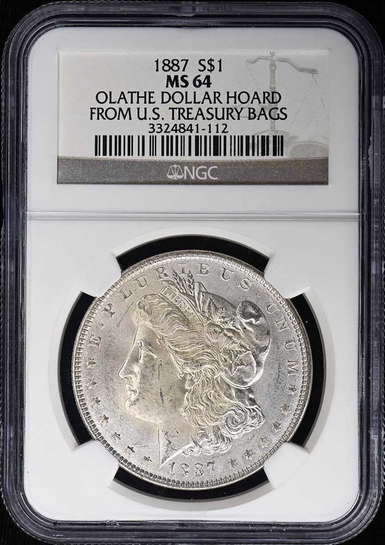NGC MS64 1887 Morgan Dollar US Silver Coin: NGC MS64 1887 Morgan Dollar US Silver Coin 1887 Morgan Dollar certified by NGC and graded MS64. This pre-owned coin is an uncirculated example of the Morgan Dollar series struck in the United States. 