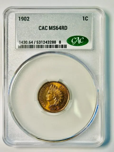 1902 USA 1c Indian Head Cent CAC MS64 RD Copper: 1902 USA 1c Indian Head Cent CAC MS64 RD Copper 1902 Indian Head small cent graded MS 64 RD with CAC certification. This pre-owned copper one-cent coin is identified as a 1902 1c RD and carries the CA