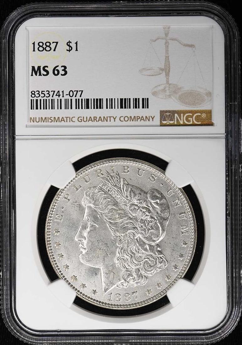 NGC MS63 1887 Morgan Dollar US Silver $1 Coin: NGC MS63 1887 Morgan Dollar US Silver $1 Coin 1887 Morgan Dollar certified by NGC and graded MS63. This uncirculated United States coin is a pre-owned example of the Morgan Dollar denomination. Specif