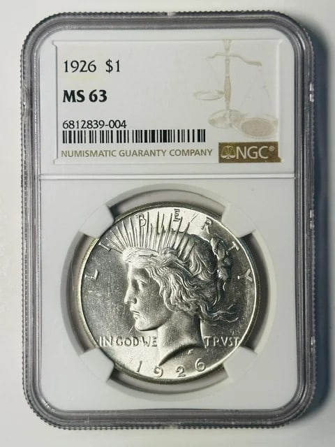 NGC MS-63 1926 Philadelphia Peace Silver Dollar: NGC MS-63 1926 Philadelphia Peace Silver Dollar 1926 Peace Dollar certified by NGC and graded MS 63. This pre-owned silver dollar was struck in Philadelphia and is denominated as one dollar. Specifica