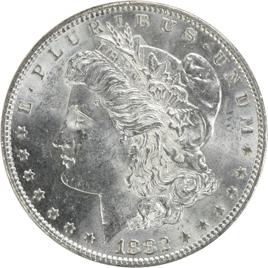 1882 Silver Dollar Morgan Type Brilliant Uncirculated Uncertified: 1882 Silver Dollar Morgan Type Brilliant Uncirculated Uncertified This is an uncirculated 1882 Morgan Silver Dollar from the United States, featuring a brilliant uncirculated (BU) grade. The coin is c