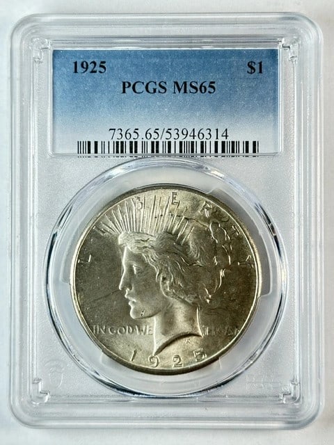 PCGS MS 65 1925 Peace Silver Dollar Philadelphia: PCGS MS 65 1925 Peace Silver Dollar Philadelphia 1925 Peace Dollar certified by PCGS and graded MS 65. This silver one-dollar coin was minted in Philadelphia and is offered in pre-owned condition. Spe