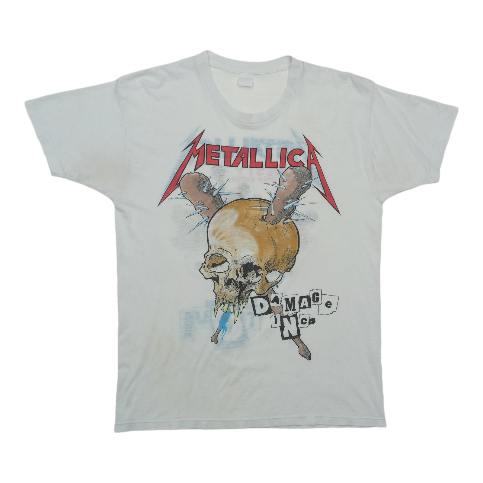 Vintage 1980s Metallica Damage Inc White Cotton Shirt: Vintage 1980s Metallica Damage Inc White Cotton Shirt This is an original vintage 1980s Metallica Damage Inc shirt, featuring authentic period design and not a modern reproduction. The shirt is made f