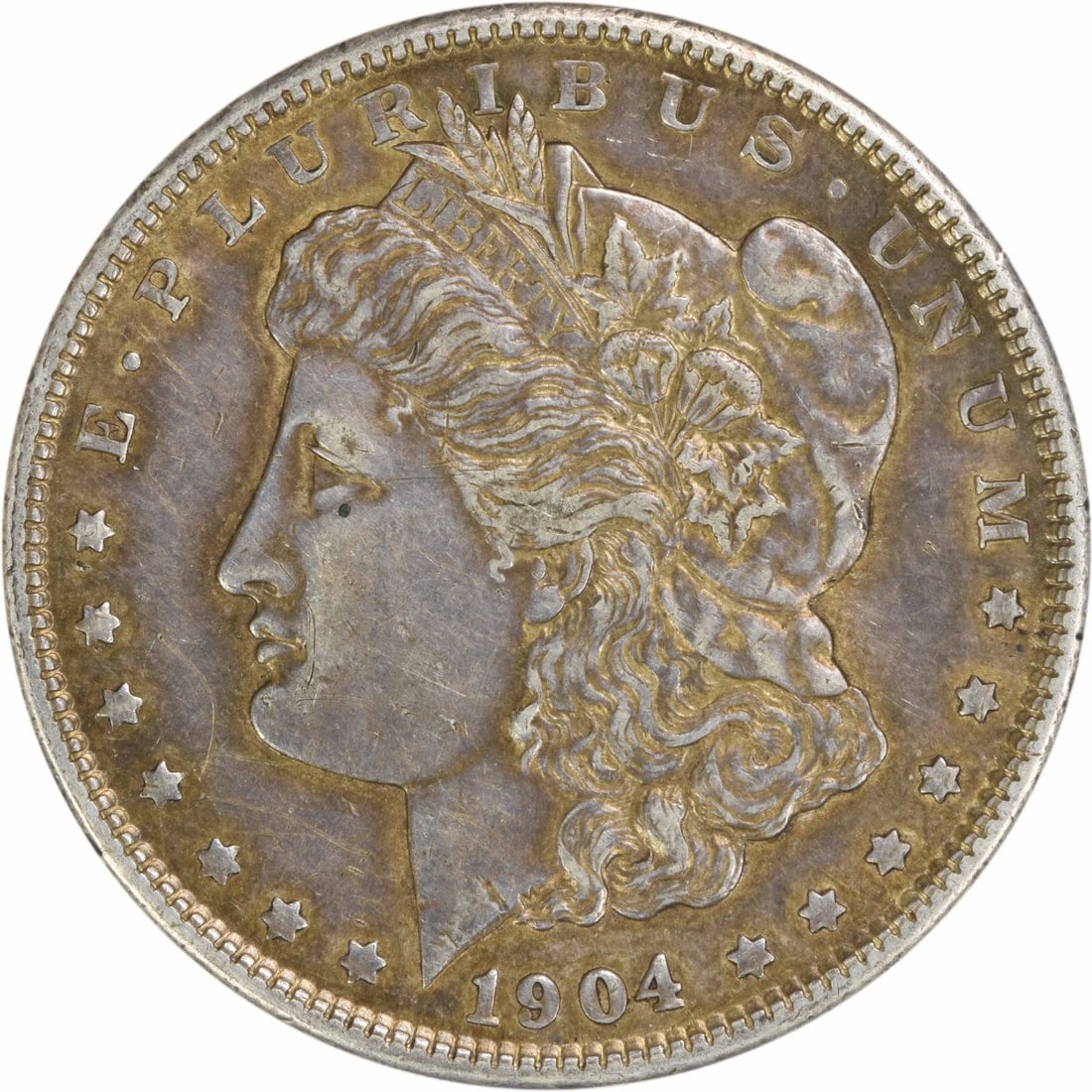 1904 Morgan Silver Dollar EF Uncertified 90% Silver Coin: 1904 Morgan Silver Dollar EF Uncertified 90% Silver Coin This 1904 Morgan Silver Dollar is an exquisite piece of numismatic history, featuring a classic design by George T. Morgan. The coin, composed 