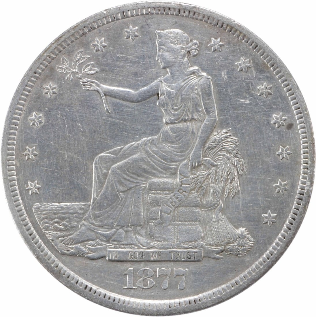 1877 San Francisco Trade Dollar AU Uncertified Silver $1 Coin: 1877 San Francisco Trade Dollar AU Uncertified Silver $1 Coin An 1877-S Trade Silver Dollar in AU grade, circulated and uncertified. This United States coin is a Trade Dollar designed by William Barbe