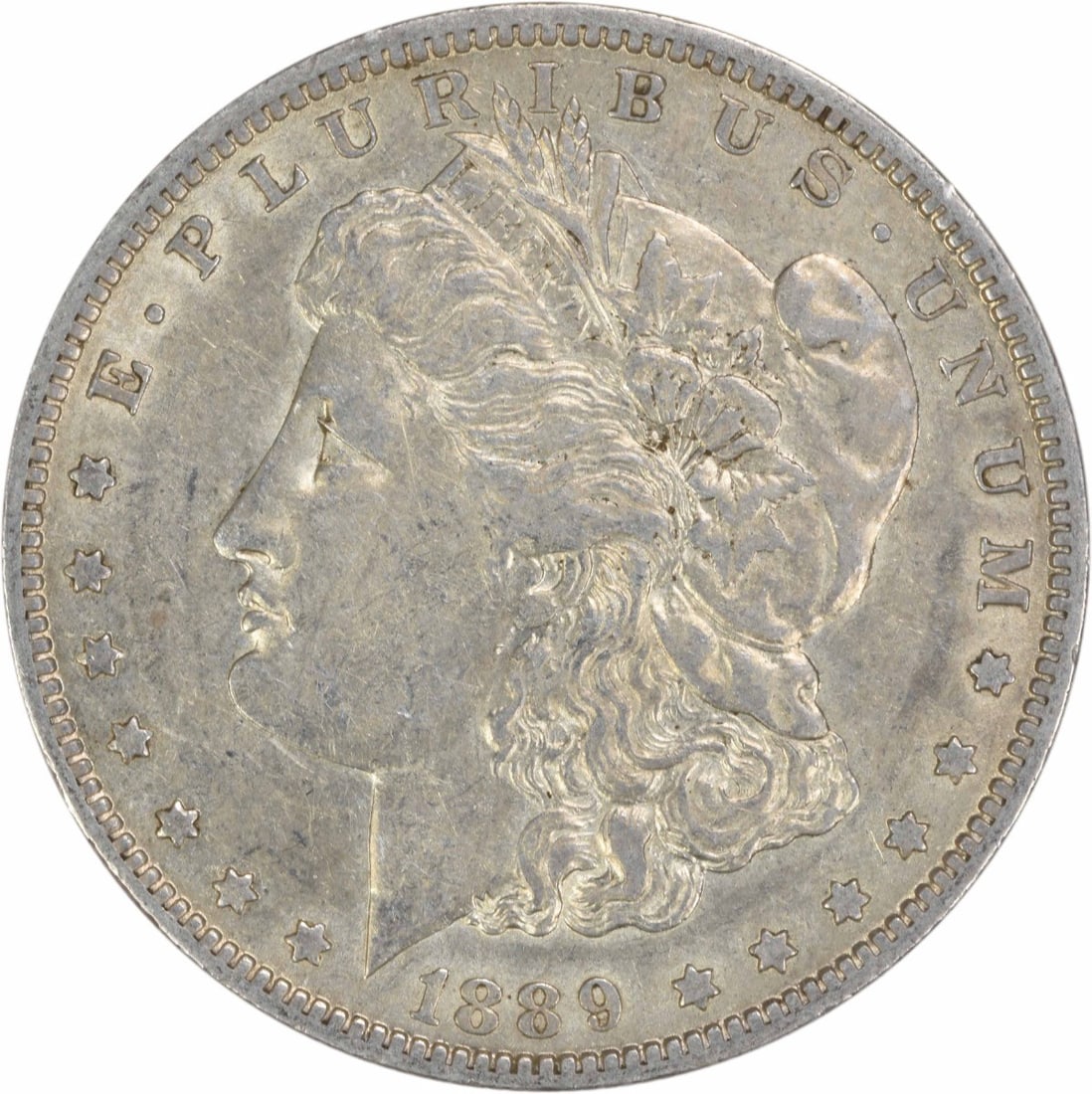 EF Grade 1889 O Morgan Dollar 90 Percent Silver Uncertified US Coin: EF Grade 1889 O Morgan Dollar 90 Percent Silver Uncertified US Coin This 1889-O Morgan Silver Dollar features a composition of 90% silver and 10% copper. Struck at the New Orleans Mint, it is graded E
