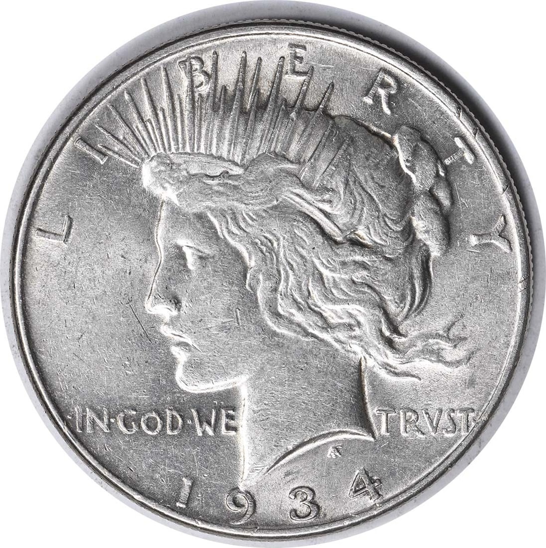 1934 $1 Peace Dollar Silver Partial Collar AU Uncertified: 1934 $1 Peace Dollar Silver Partial Collar AU Uncertified 1934 Peace Silver Dollar with a partial collar strike. This uncertified, pre-owned coin is composed of silver and is listed in About Uncircula