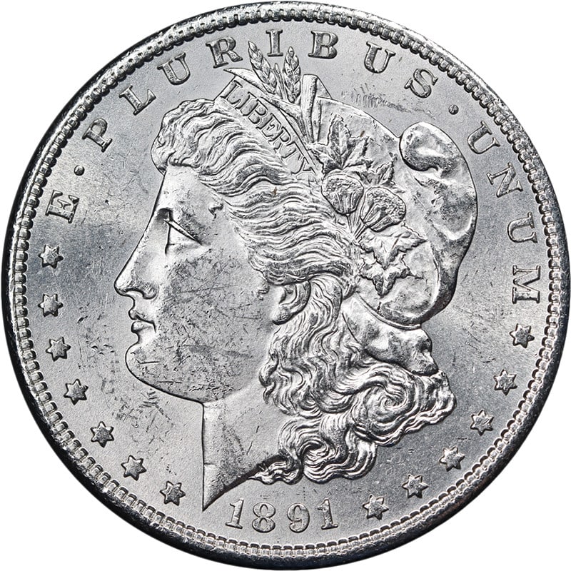 1891 S Morgan Silver Dollar Choice BU: 1891 S Morgan Silver Dollar Choice BU This 1891-S Morgan Silver Dollar is an uncirculated coin featuring a brilliant blast white appearance, strong strike, and attractive luster. It is composed of 0.9