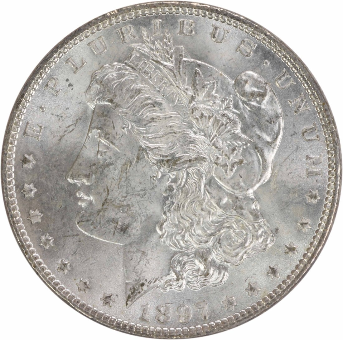 1897 Morgan $1 Silver Coin BU Uncertified: 1897 Morgan $1 Silver Coin BU Uncertified This is an 1897 Morgan Silver Dollar in Brilliant Uncirculated (BU) condition. The coin is composed of silver, was minted in the United States, and does not b