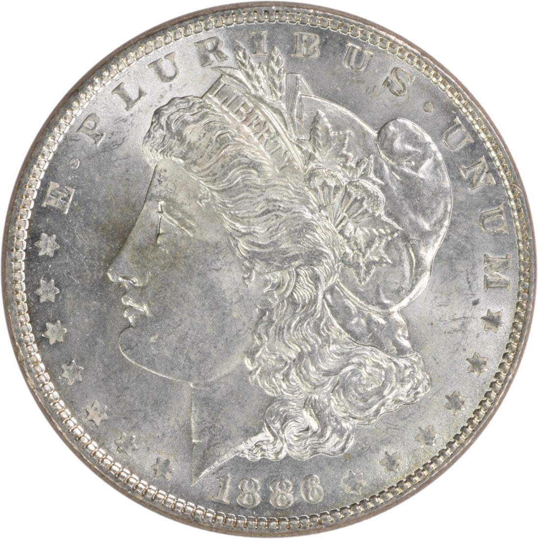 Choice BU 1886 Silver Morgan Dollar Uncirculated No Mint Mark: Choice BU 1886 Silver Morgan Dollar Uncirculated No Mint Mark This is an 1886 Morgan Silver Dollar from the United States, featuring a Choice Brilliant Uncirculated (BU) grade. The coin is composed of