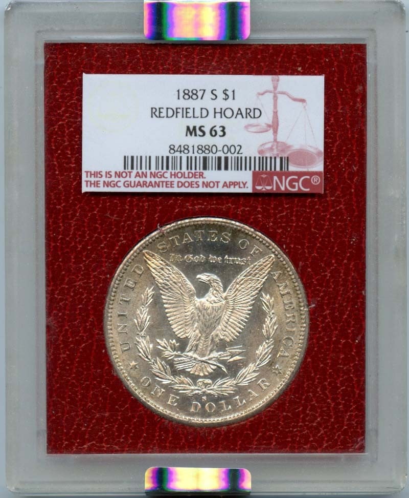 NGC MS63 1887 Redfield Hoard Silver Dollar: NGC MS63 1887 Redfield Hoard Silver Dollar 1887 Redfield Hoard $1 coin graded NGC MS63. This pre-owned coin is listed as uncirculated and certified by NGC. Specifications Item Type: $1 coin Year: