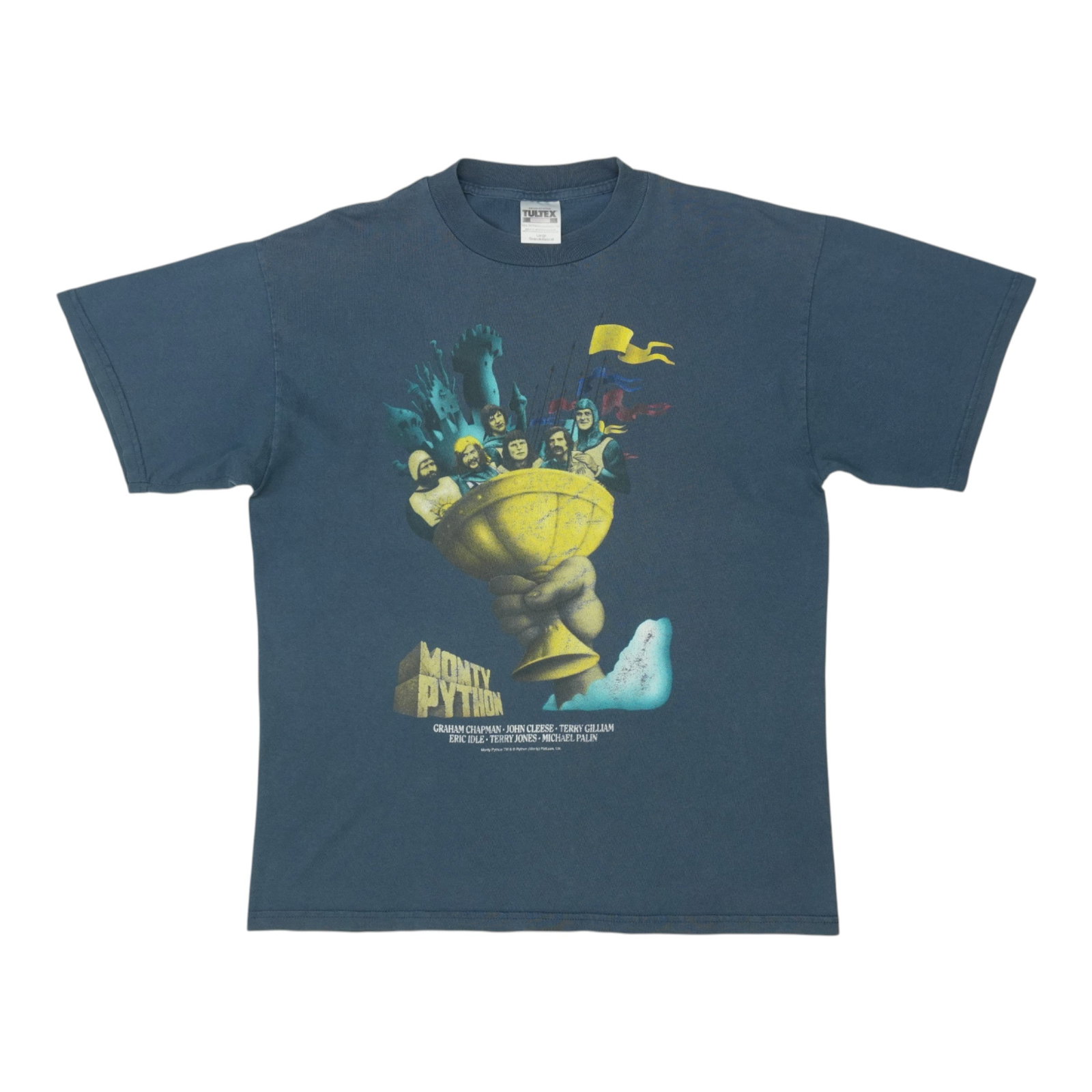 Vintage 1990s Monty Python and the Holy Grail Blue Cotton T-Shirt: Vintage 1990s Monty Python and the Holy Grail Blue Cotton T-Shirt This is an original vintage 1990s Monty Python Holy Grail shirt, not a modern reproduction. The shirt is made from 100% cotton and fea